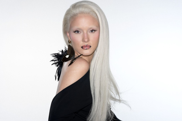 Zara Larsson portrait against a white background for Allure's cover shoot